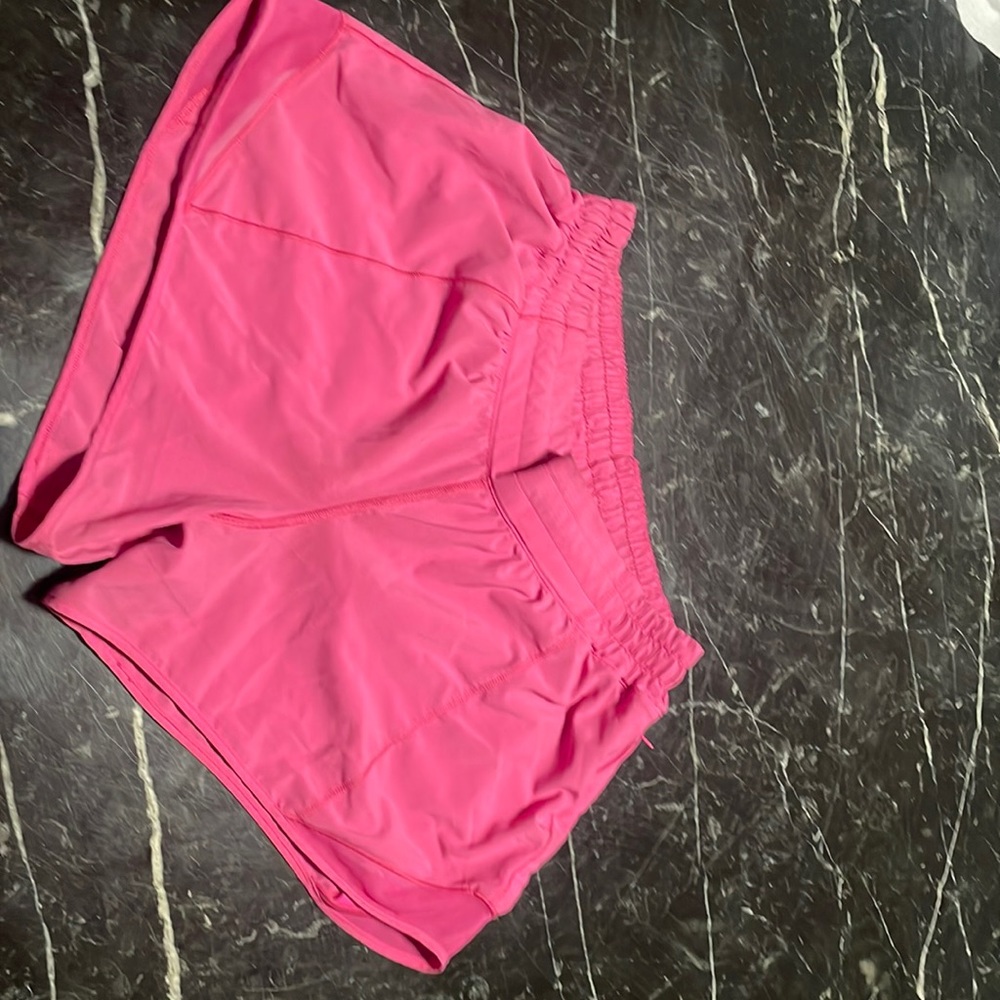 Lululemon Hotty Hot Low rise 4.0 inch size 10 Sonic Pink shorts💗